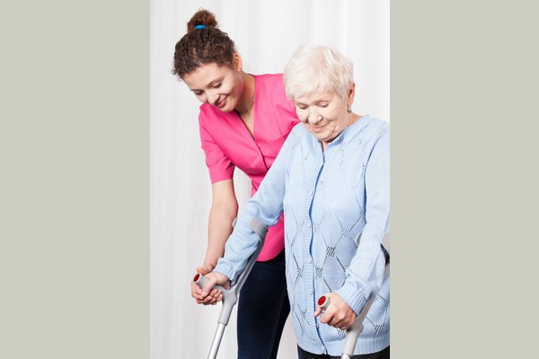 Caregiver Assisting in Ambulation